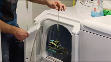 machine drying shoes in dryer